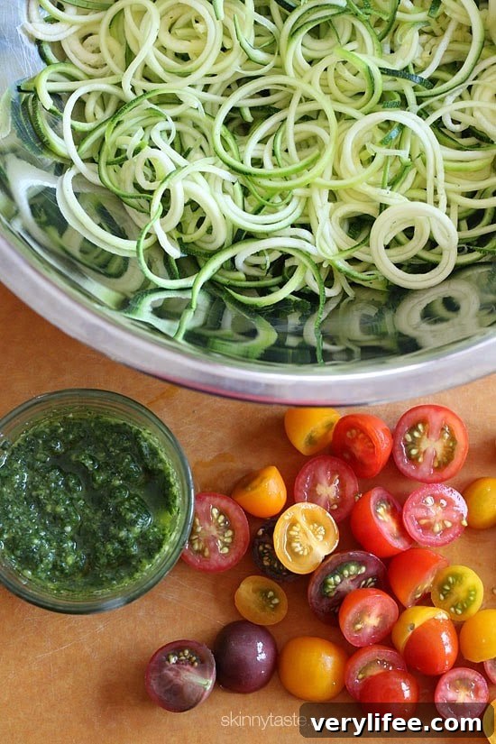Raw Spiralized Zucchini Noodles with Tomatoes and Pesto plated