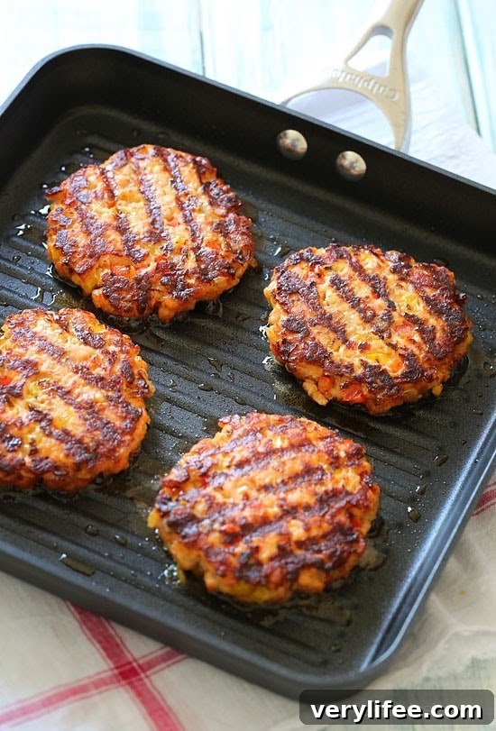 Some burgers are just meant to be eaten without a bun. These delicious, omega-packed, naked salmon burgers with sriracha mayo are the perfect example!