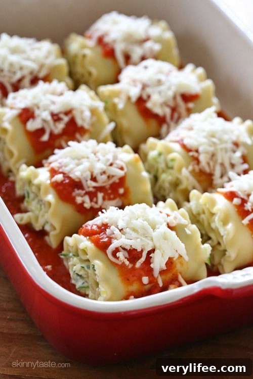 Zucchini Lasagna Roll-Ups Recipe 6 Close-up of baked lasagna rolls with melted cheese