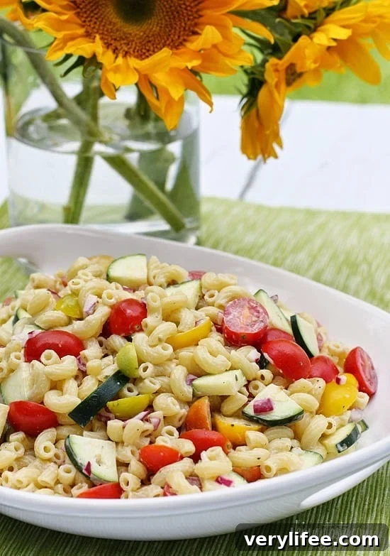 35 Zucchini Recipes for Every Meal 28 Summer Macaroni Salad with Tomatoes and Zucchini