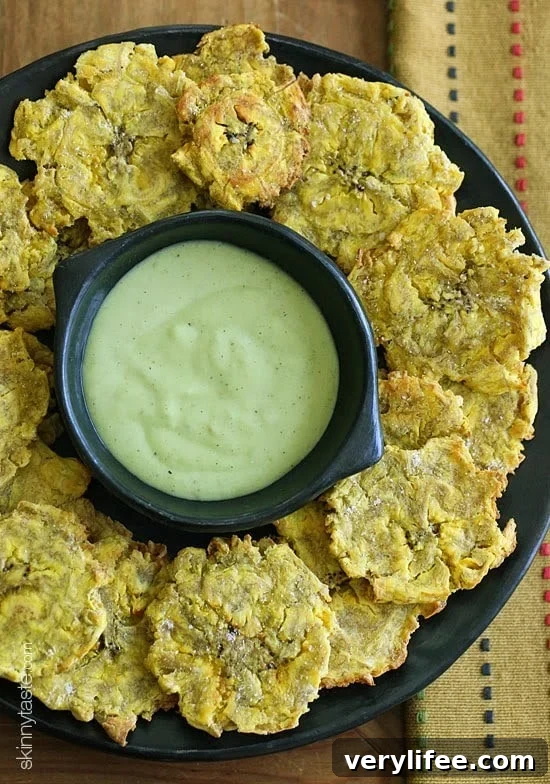 Crispy Oven-Baked Tostones Recipe with Green Plantains 2 Baked Tostones – These savory plantains have been made lighter by baking instead of frying – you won't believe how good they taste!