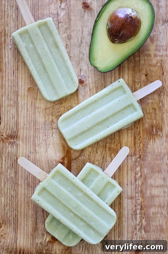 These creamy avocado coconut popsicles are made with just 4 ingredients – nutrient dense avocados, coconut-almond milk, raw sugar and coconut flakes.