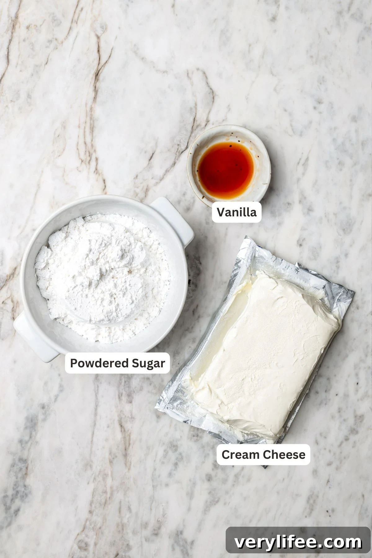 Overhead view of frosting ingredients for fruit pizza