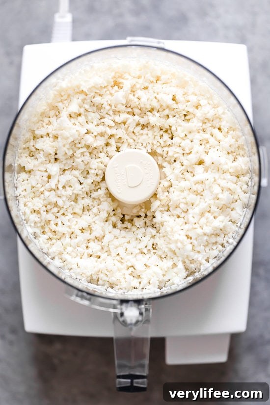 Cauliflower Fried Rice Recipe for Low-Carb Stir-Fry 4 Riced cauliflower in food processor.