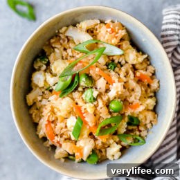 Cauliflower Fried Rice Recipe for Low-Carb Stir-Fry 8 Bowl of cauliflower fried rice with eggs.