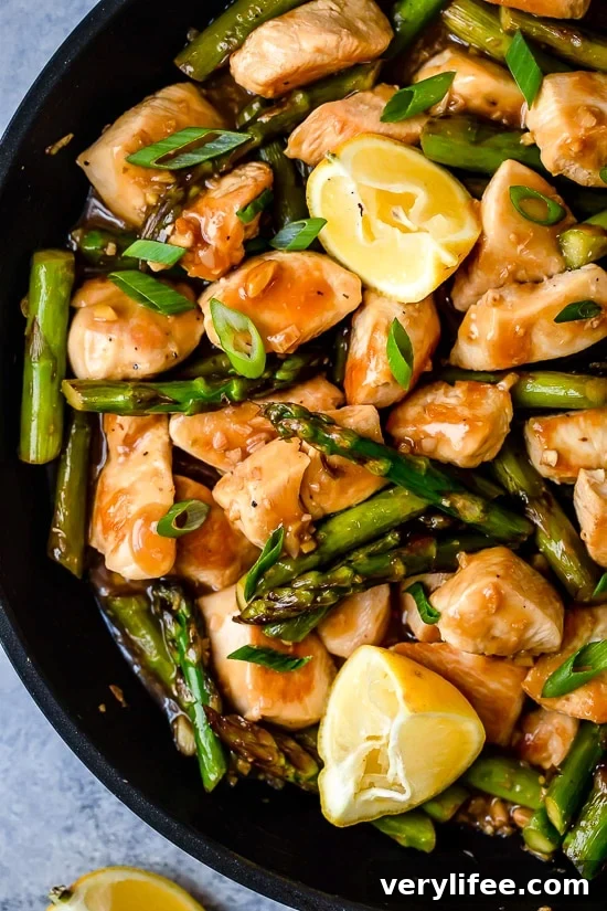 This quick weeknight Chicken and Asparagus Lemon Stir Fry is perfect for spring, made with lean chicken breast, asparagus, fresh lemon, garlic and ginger.