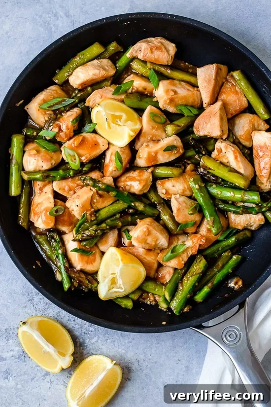 This quick weeknight Chicken and Asparagus Lemon Stir Fry is perfect for spring, made with lean chicken breast, asparagus, fresh lemon, garlic and ginger.