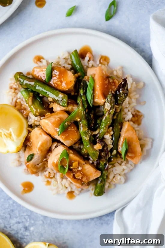 This quick weeknight Chicken and Asparagus Lemon Stir Fry is perfect for spring, made with lean chicken breast, asparagus, fresh lemon, garlic and ginger.