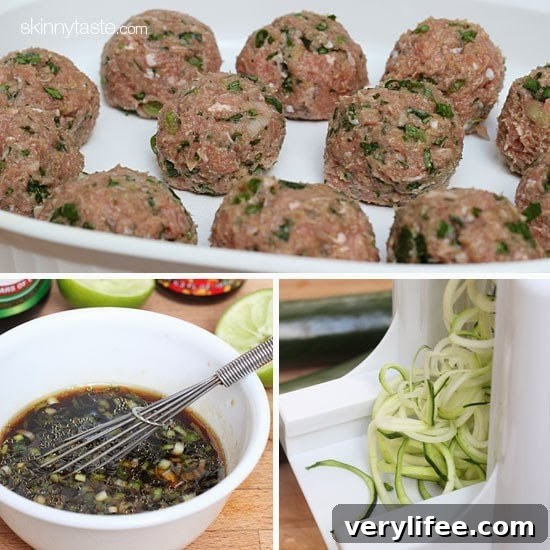 Uncooked turkey meatballs on a tray, zoodles being spiralized and a bowl of sesame lime dipping sauce with a whisk.