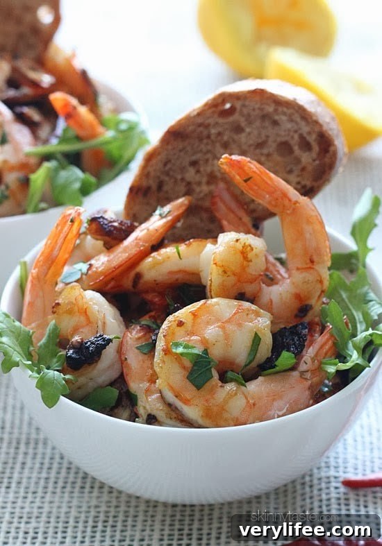 Sauteed shrimp with garlic, dried chilies and lemon juice – it's spicy, garlicky, acidic and sooooo good! You can serve this as an appetizer or for dinner