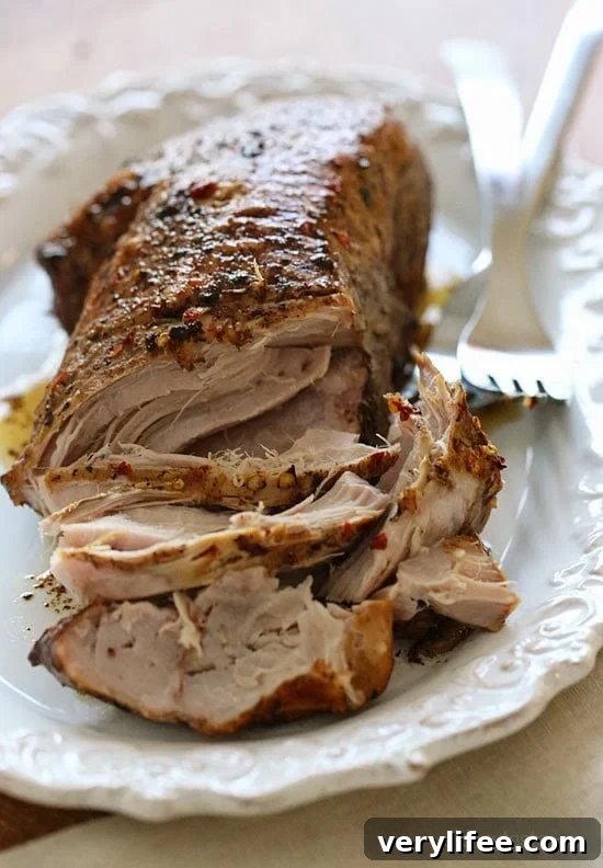 Crock Pot Balsamic Pork Roast This Crock Pot Balsamic Pork Roast is so easy and literally falls apart once cooked. Here it's cooked with balsamic vinegar and honey which gives it a slight tang that I love!