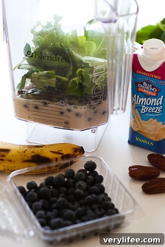 Creamy Blueberry Kale Smoothie Recipe 2 Black is the new green! The dark color of this smoothie is from antioxidant rich blueberries and kale added with almond milk, peanut butter, ripe banana, dates.