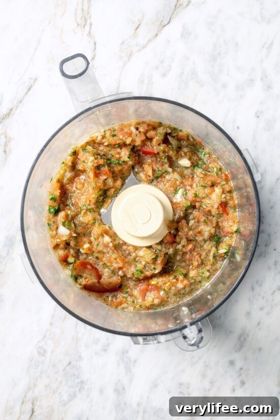 This chicken lentil soup is hearty, flavorful, and easy to make. It’s a nourishing, protein-packed meal perfect for cold days. Vegetables in food processor.