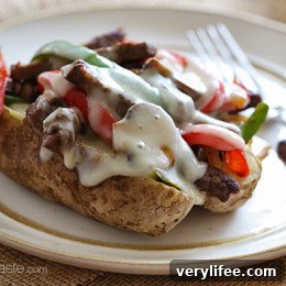 Final loaded Philly cheesesteak baked potatoes