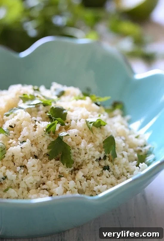 Cilantro Lime Cauliflower "Rice" served as a side with grilled pork or chicken