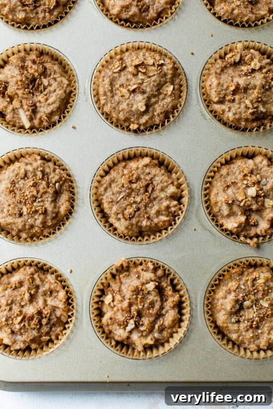 Homemade Apple Cinnamon Muffins Recipe 7 Muffin batter ready to bake.