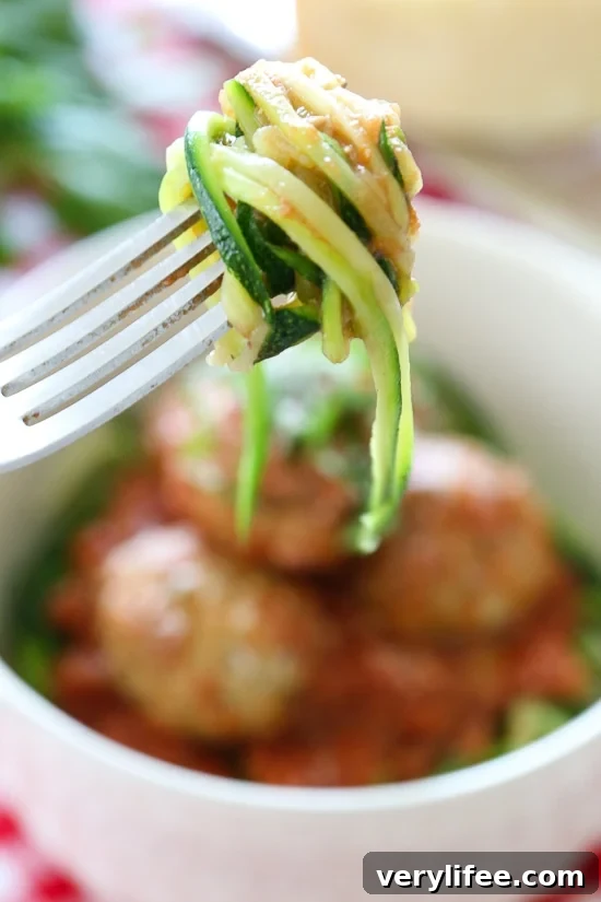 Zoodles with Slow Cooker Turkey Meatballs 3 Zoodles and meatballs close-up.