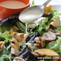 Grilled stone fruit like peaches and plums served over baby greens with walnuts and a sweet honey goat cheese dressing, this salad is light and delicious!