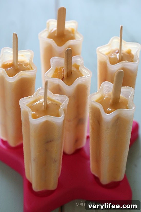 These peaches and cream popsicles made with juicy, ripe peaches, yogurt, almond milk and almond extract make a wonderful treat on a hot summer day like today.