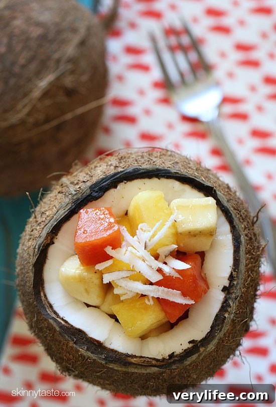 Tropical Fruit Salad Recipe with Honey Lime Dressing 3 This tropical fruit salad, made with fresh papaya, mango, pineapple, bananas and grated coconut is the best tasting fruit salad... EVER!!
