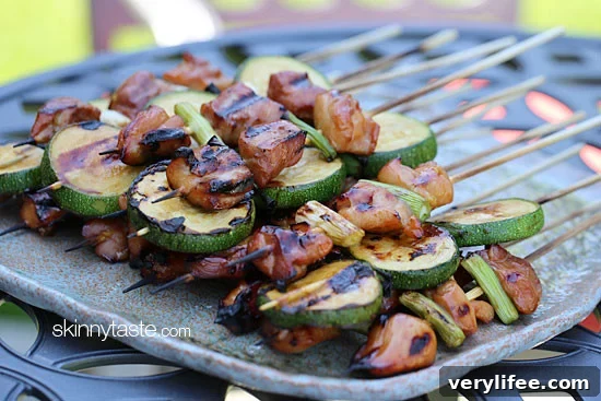 Japanese Chicken Yakitori Skewers Recipe 2 Grilled Chicken and Zucchini Yakitori – Japanese inspired grilled chicken and zucchini skewers marinated with yakitori sauce and threaded onto bamboo sticks with green onions.