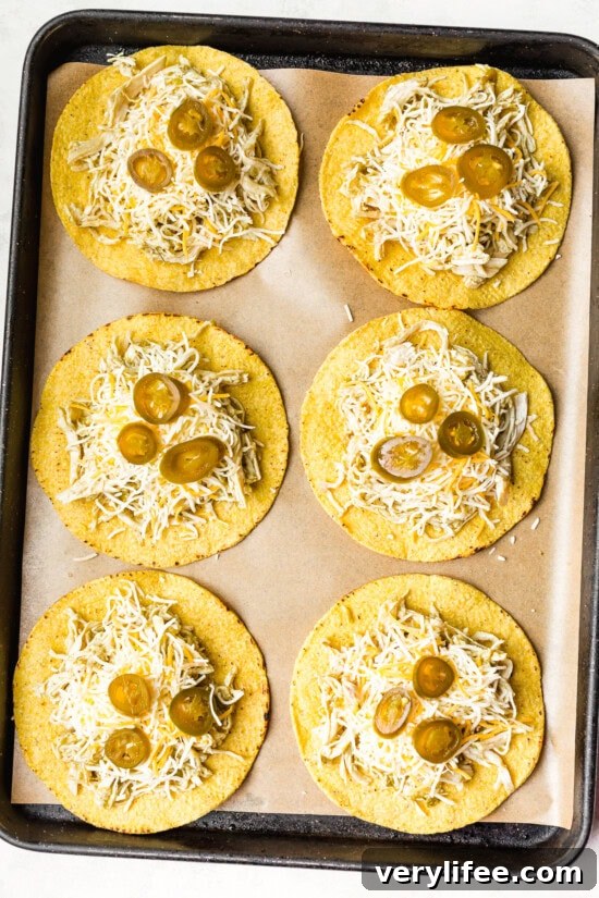 Turn Leftover Chicken Into Salsa Verde Tostadas 7 assemble the tostadas and bake