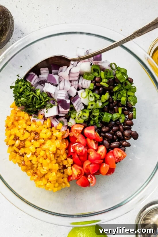 black bean and corn salad ingredients in a bowl