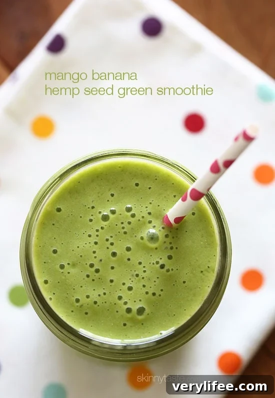 Start the morning RIGHT with this super delicious, creamy green smoothie made with frozen banana, baby spinach, fresh mango, hemp seeds and almond milk.