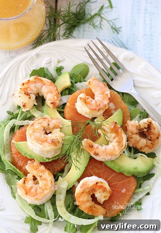 Grilled shrimp, slices of avocado, shaved fennel and oranges are served over baby kale and mixed greens then topped with a citrus vinaigrette.