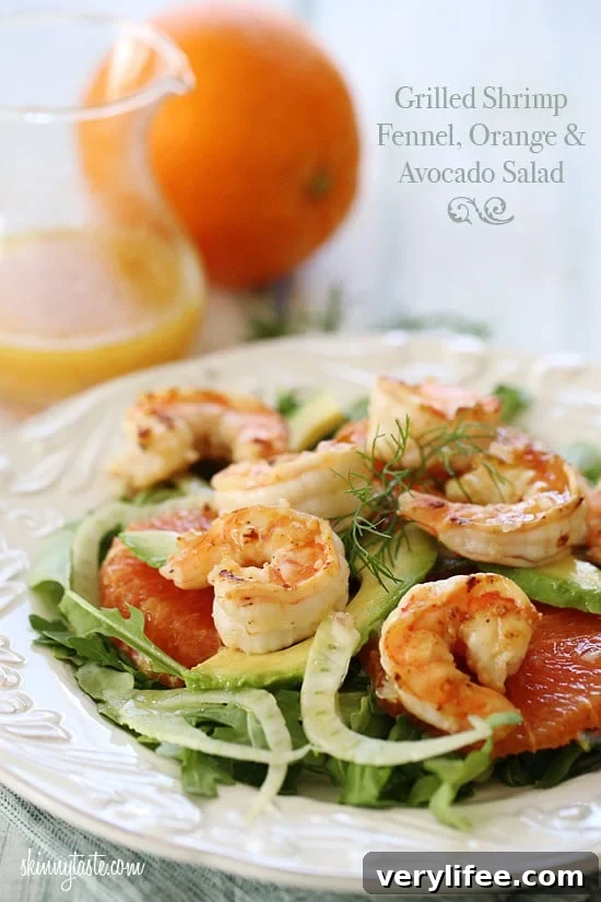 Salad with grilled shrimp, avocado, fennel and orange