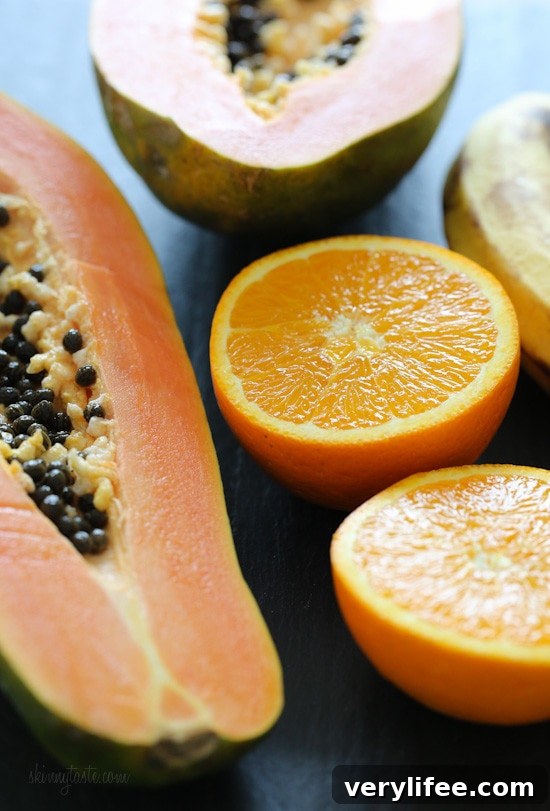 Fresh papaya halves ready for blending into a batido