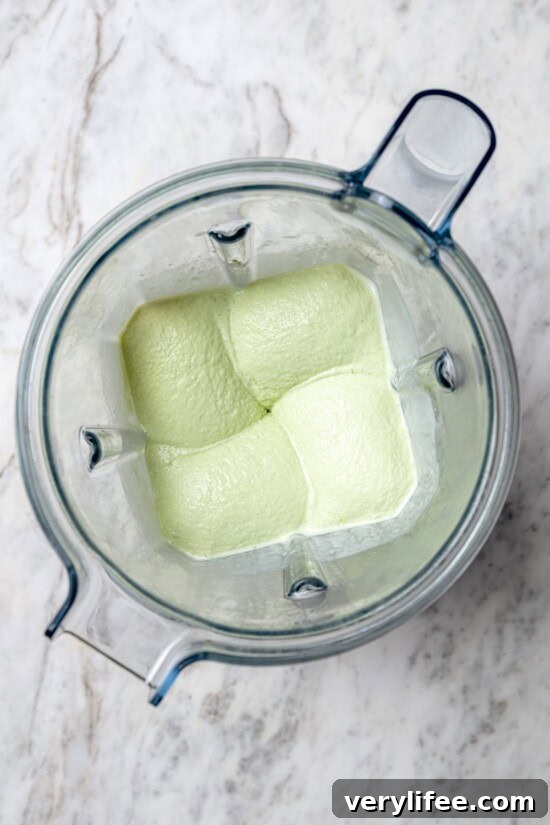 Top-down view of shamrock shake in blender