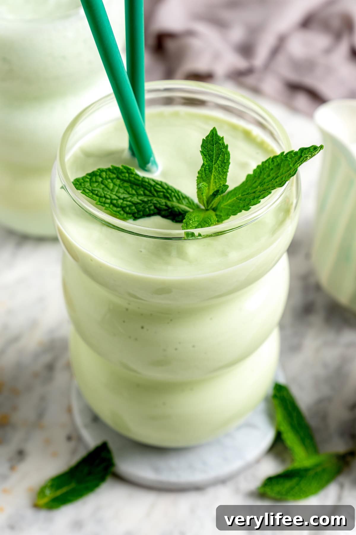 Copycat shamrock shake in glass with mint leaves for garnish