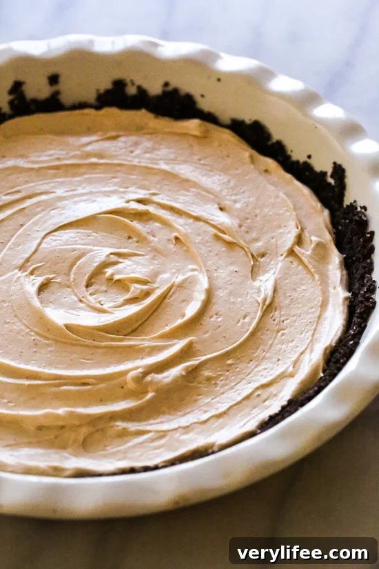 Creamy No-Bake Peanut Butter Pie with Chocolate Crust 4 This easy No Bake Peanut Butter Pie is light and creamy – one of my favorite dessert recipes!