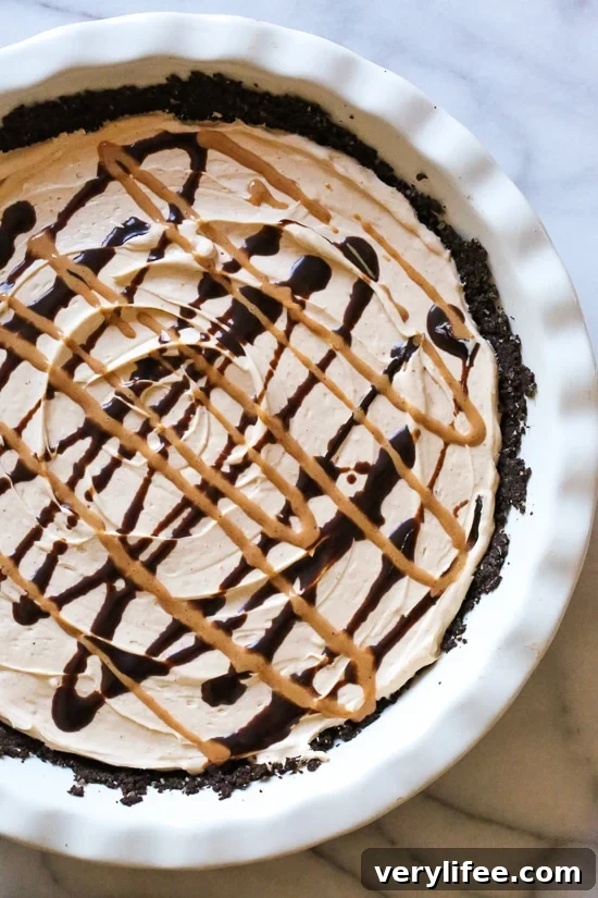 Creamy No-Bake Peanut Butter Pie with Chocolate Crust 6 This easy No Bake Peanut Butter Pie is light and creamy – one of my favorite dessert recipes!