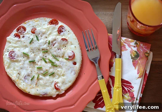 A quick and easy breakfast made with tomatoes, egg whites, mozzarella, and parmesan cheese. Lots of flavor, low in carbs and takes just minutes to make.