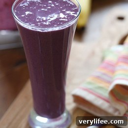 Blueberry Banana PB Smoothie in a tall glass