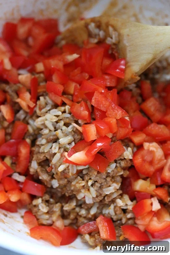 Slow Cooker Stuffed Peppers Recipe 2 Leftover picadillo and brown rice makes a super easy second meal, all in the CrockPot. Stuffed peppers topped with melted cheddar or Monterey Jack cheese and you'll have a delicious dinner without much fuss -a complete meal-in-one.