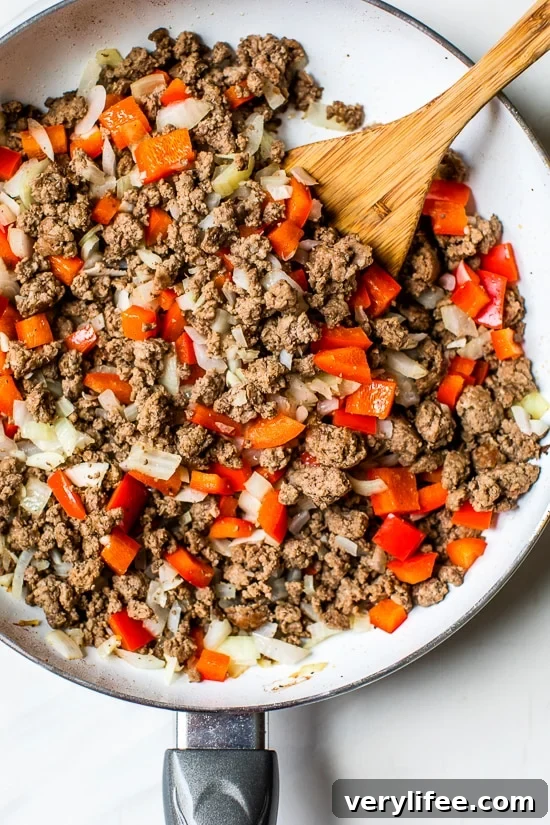 Slow Cooker Picadillo Recipe with Ground Beef 3 Browning meat in the skillet to make picadillo in the slow cooker.