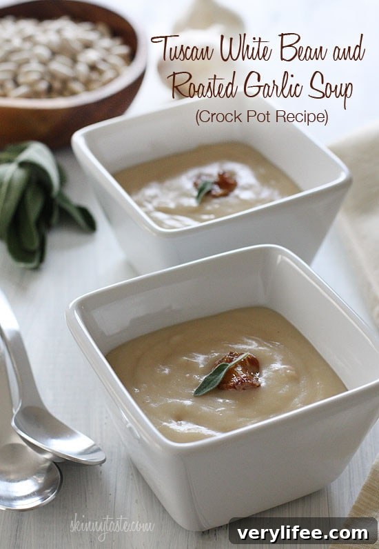 Creamy Tuscan white bean soup with roasted garlic and sage
