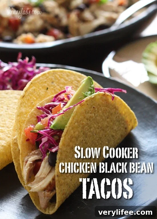 This easy taco recipe requires no pre-cooking, just throw it all in the crock pot and you'll have a delicious weeknight meal. Black beans and chicken breast, simmered in the slow cooker make the perfect filling for tacos, burritos, enchiladas, or even a burrito bowl and it's loaded with fiber.