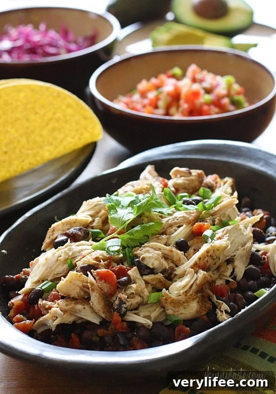 Slow cooker chicken and black beans cooking together