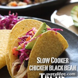 Plated slow cooker chicken black bean tacos