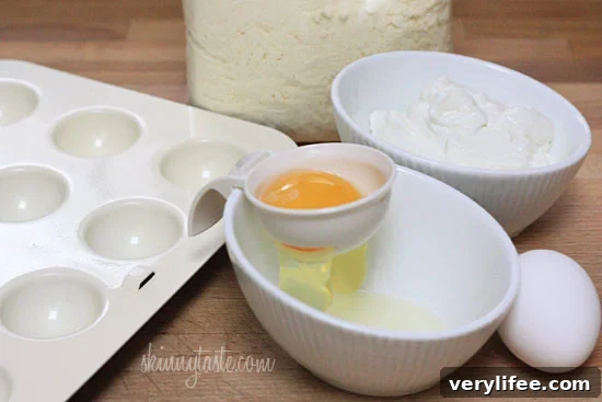These Skinny Cake pops are made lighter by using a box cake mix, egg whites and fat free Greek yogurt – no oil, no butter required!