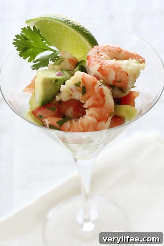 Shrimp ceviche cocktail with avocado and lime