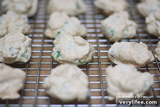Bite showing airy interior of meringue cloud