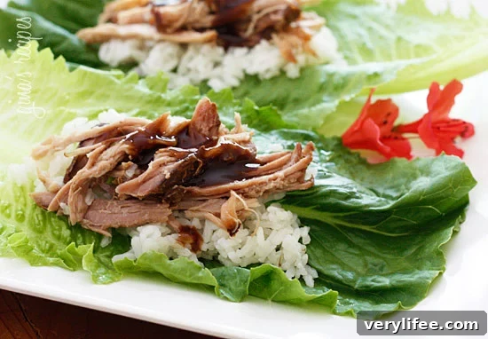 Slow Cooker Kalua Pork This EASY 3-ingredient slow cooker kalua pork dish has become a staple in my house! We make it at least once a month because it's SO easy and it makes enough for several meals!