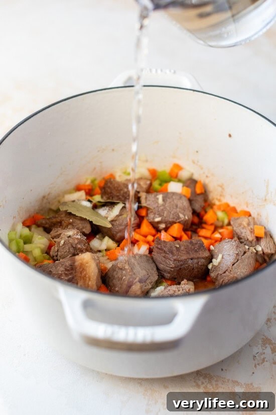 Hearty Beef and Barley Soup Recipe 8 Add water