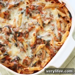 Cheesy baked pasta made with Italian chicken sausage, mozzarella, ricotta, Pecorino Romano and spinach (but don't worry, no one will care about the green stuff). Perfect to feed a hungry family!