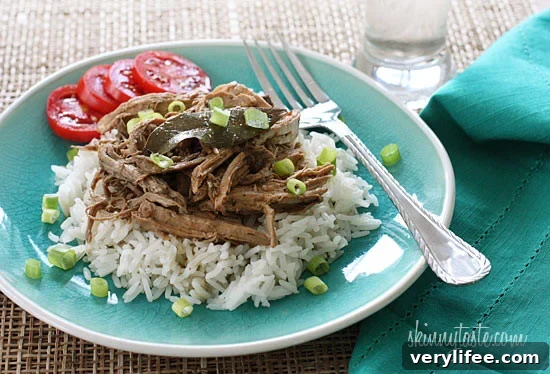 Slow Cooker Filipino Adobo Pulled Pork—tender shredded pork flavored with soy, vinegar, garlic and bay leaves